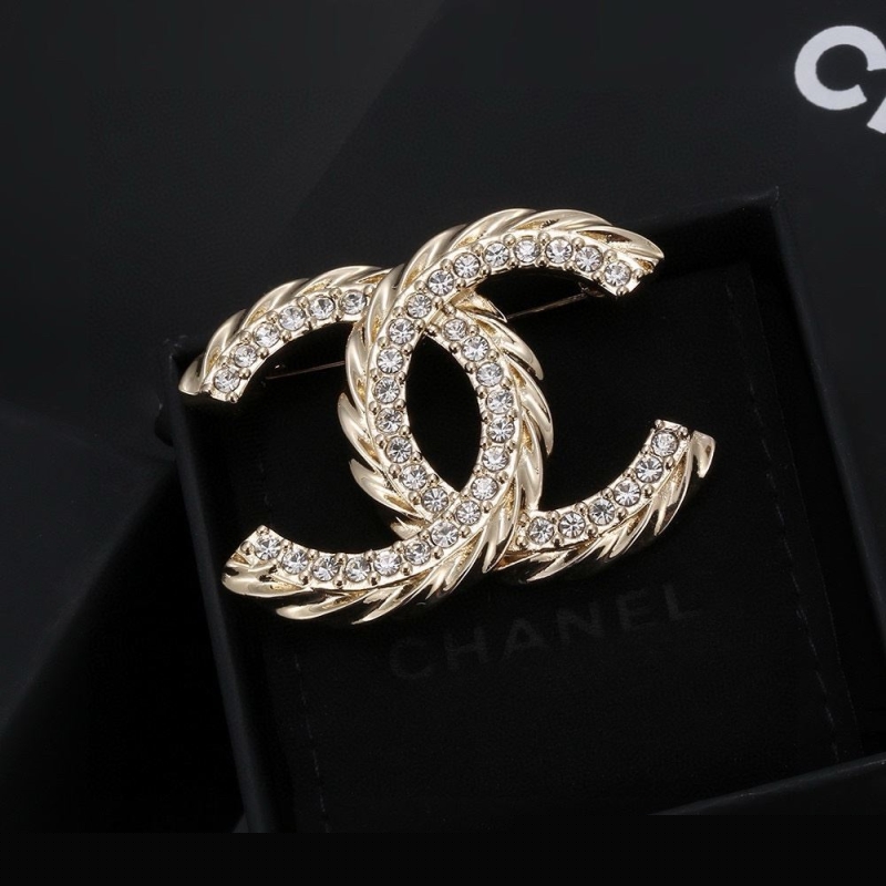 Ch*el brooches